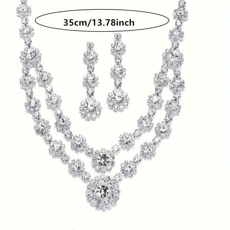 with a single row of rhinestone necklace with a pair of matching earrings.